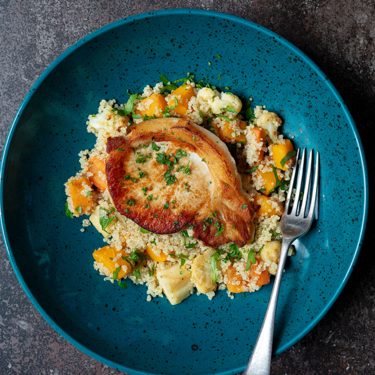 Pork chops with winter vegetables and quinoa