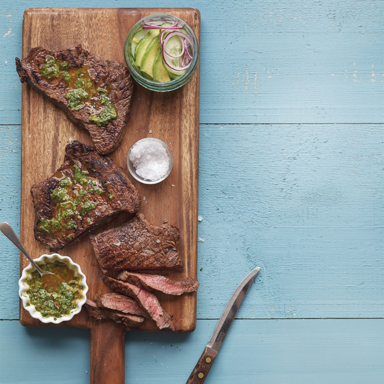 Chilli beef with avocado salad and Thai chimichurri