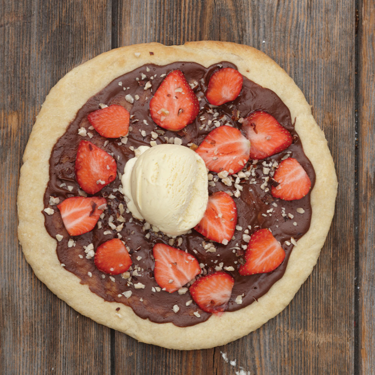 Chocolate, hazelnut and strawberry pizza