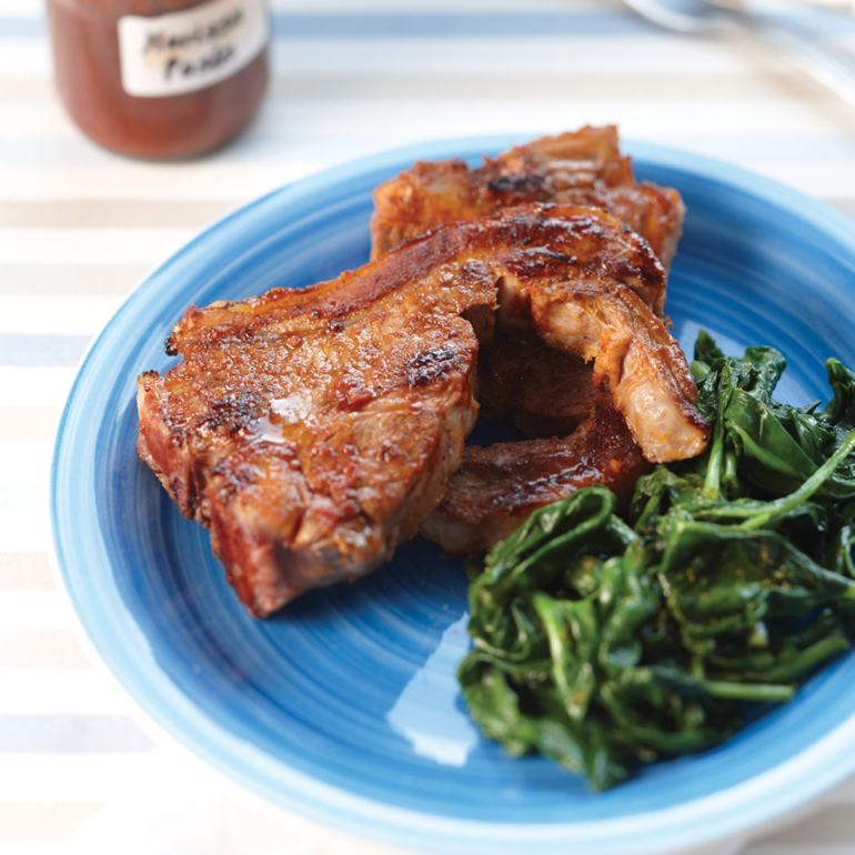 Fiery harissa lamb chops with spinach