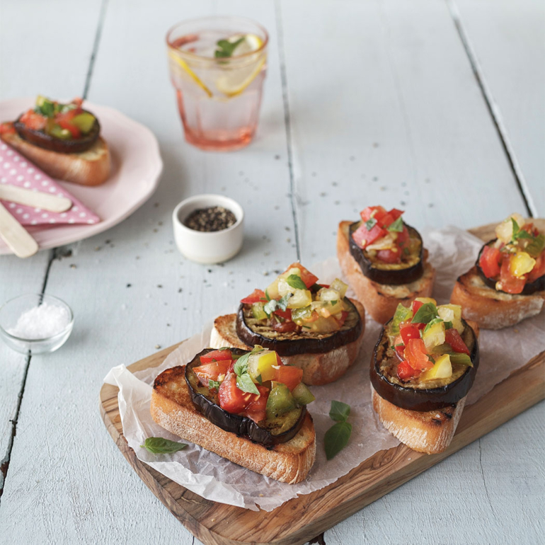 Grilled aubergine bruschettas with tomato and basil