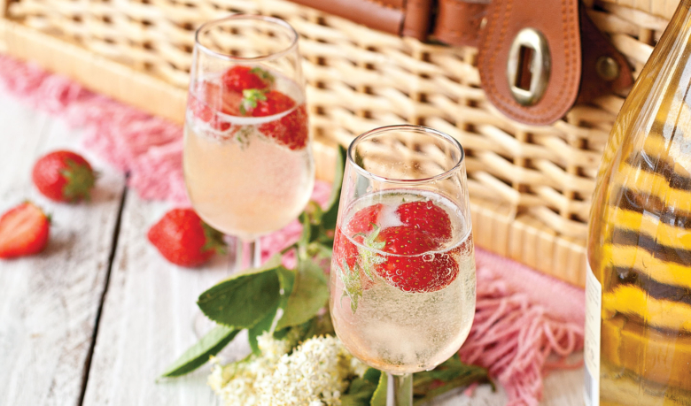 Prosecco with strawberries and elderflower
