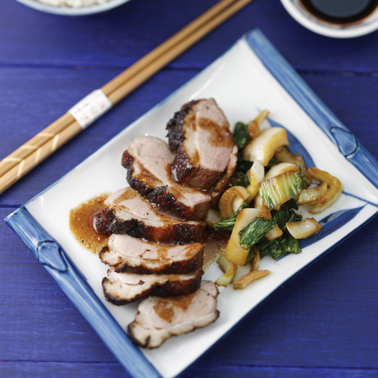 Crispy duck breasts with pak choi