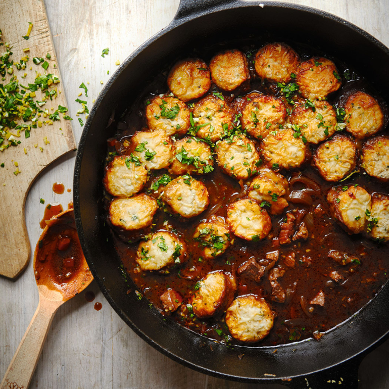 Beef and stout soup with herb and cheese dumplings