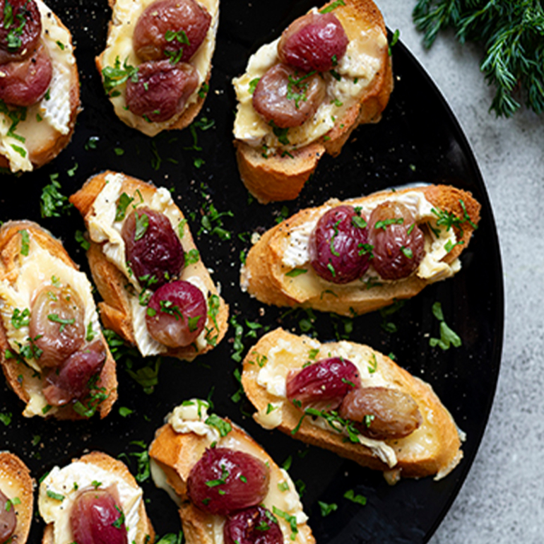 Camembert crostini with roasted grapes