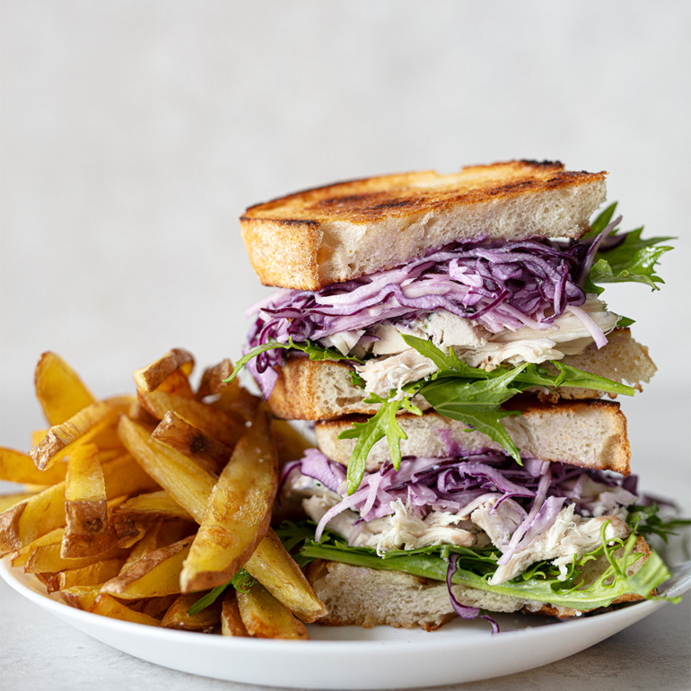 Chicken and goat’s cheese sandwich with purple slaw