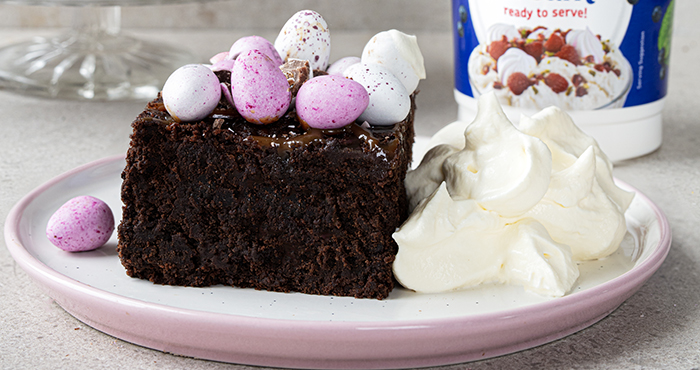 Easter salted caramel brownies with whipped cream by avonmore