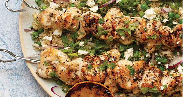 Herby chicken skewers with spring quinoa