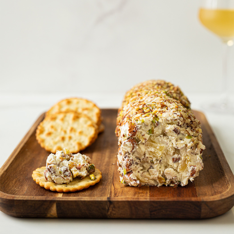 Pineapple cheese log with almonds, pecans and pistachios