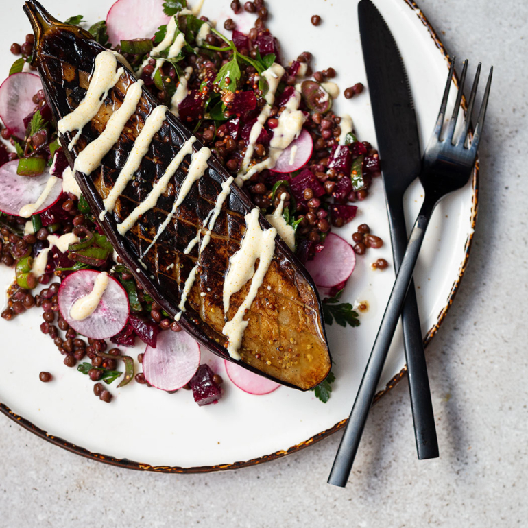 Simple roasted aubergine with lentil and herb salad