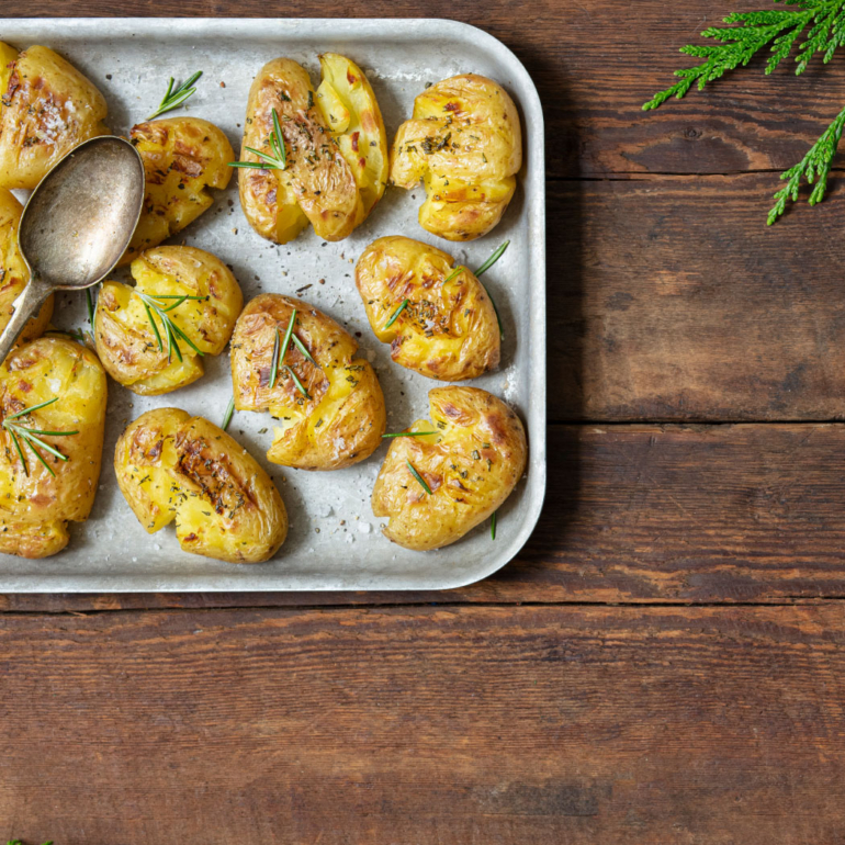 Smashed baby  potatoes with  sea salt and  rosemary