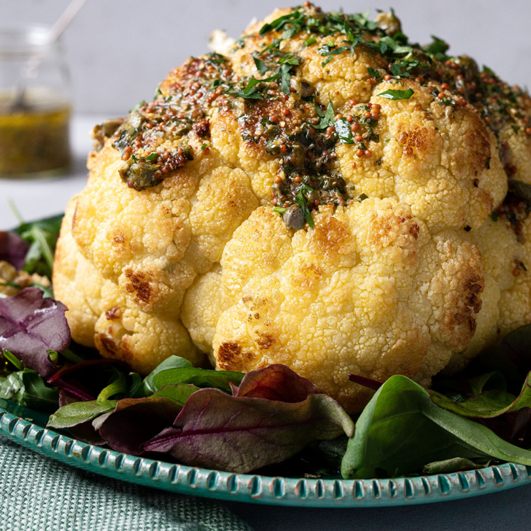 Whole roasted cauliflower with caper dressing