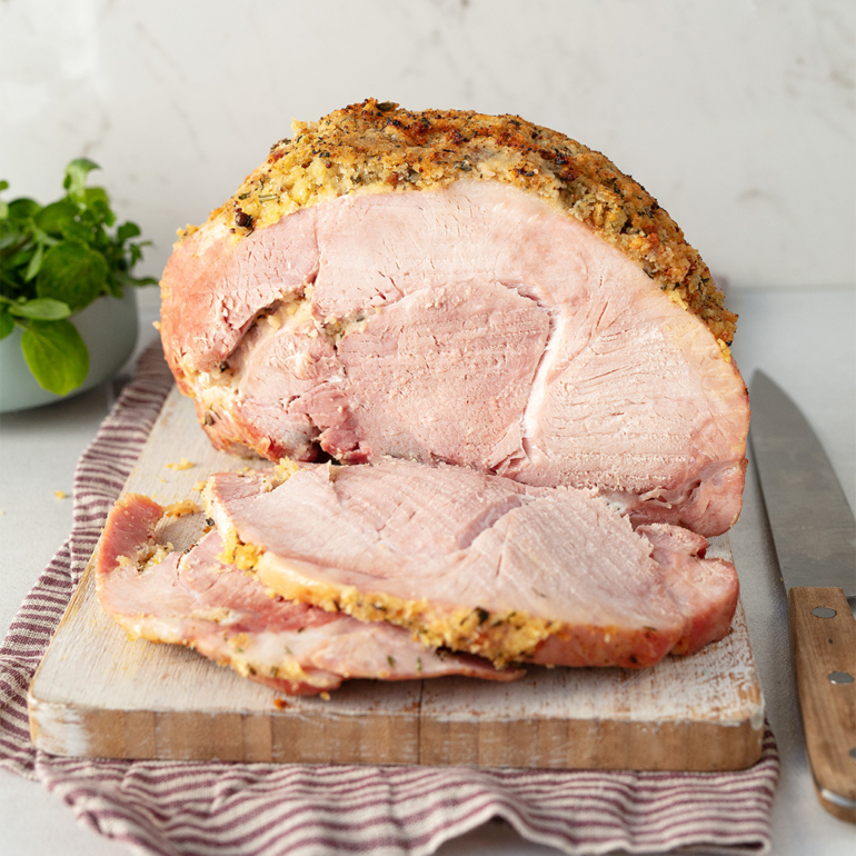 Baked ham with a herb crust