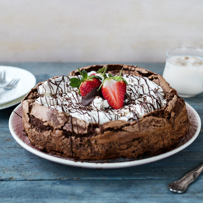 Decadent flourless chocolate coffee cake with Baileys whipped cream