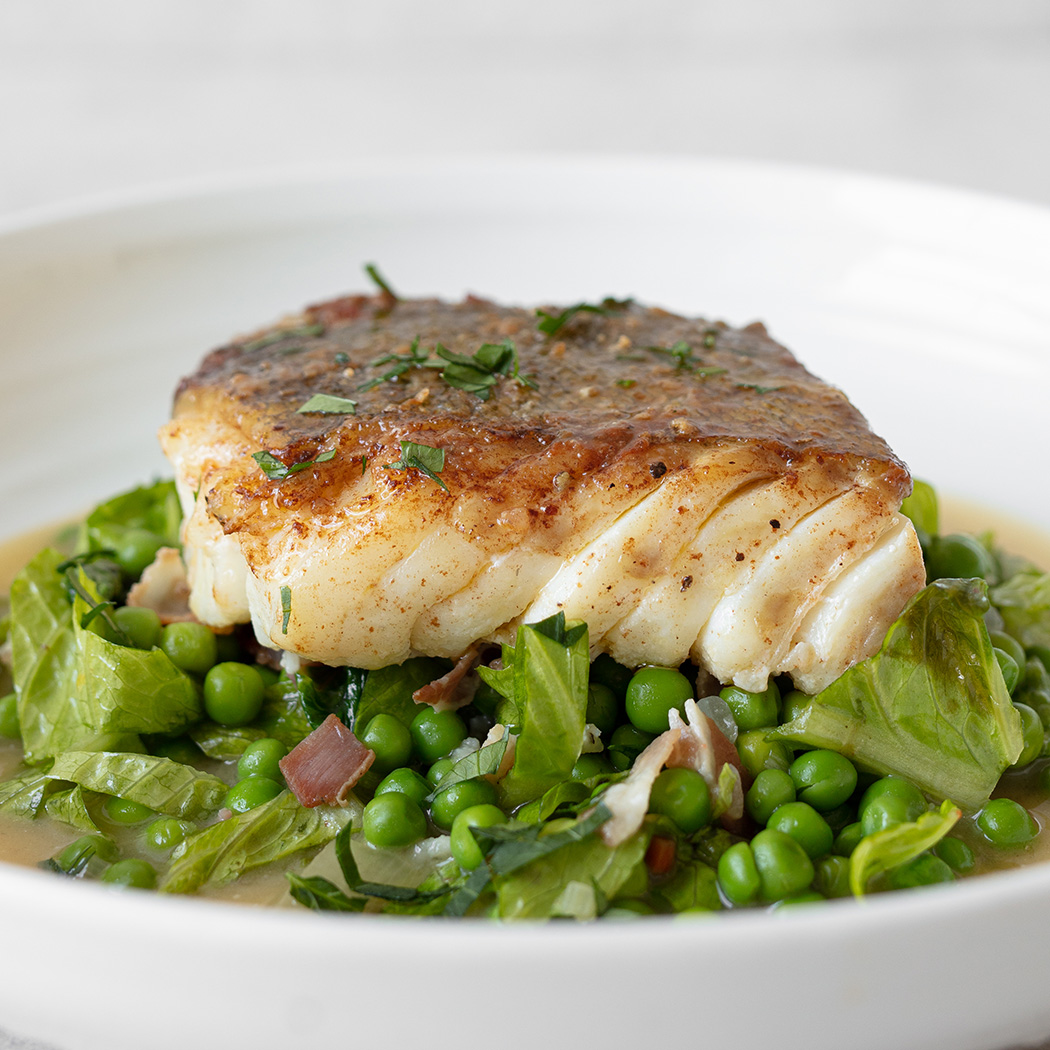 Pan-fried cod with peas bonne femme | easyFood