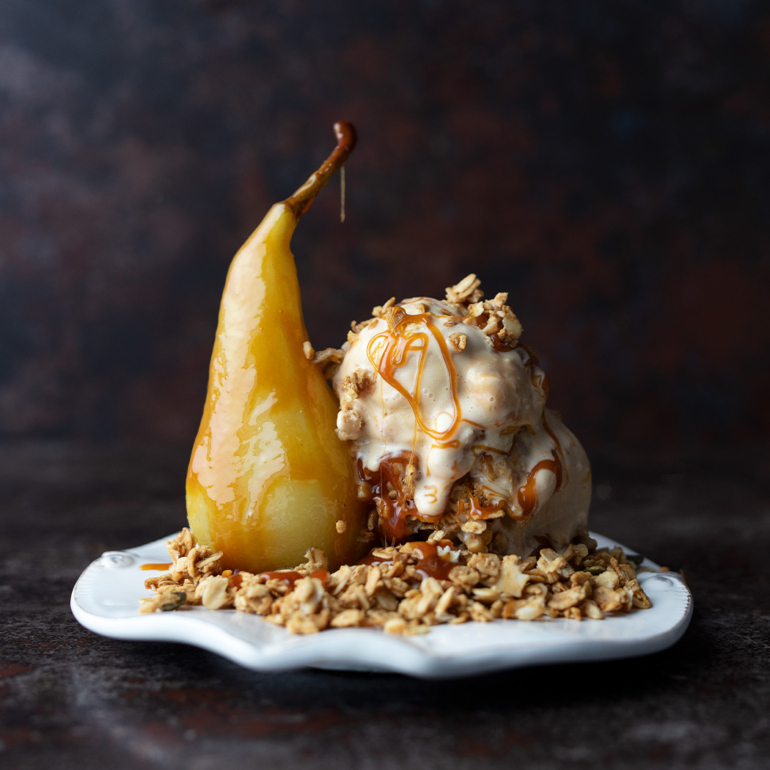 Poached pears with granola and ice cream