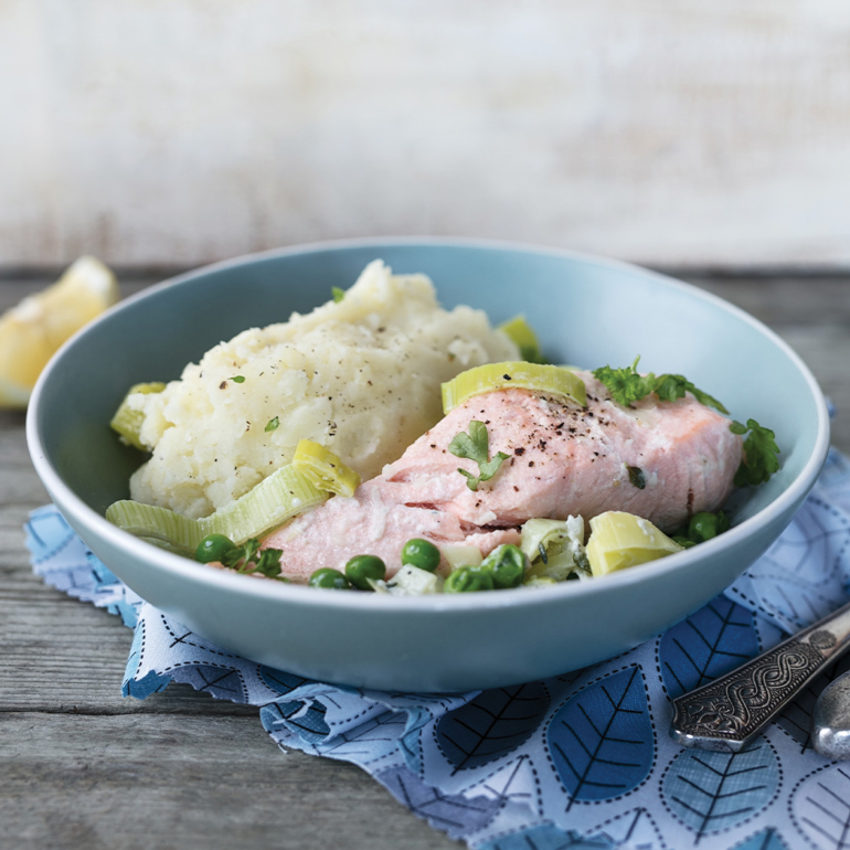 Poached salmon with mash and greens