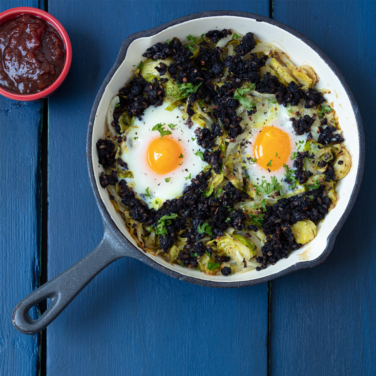 Sprout and black pudding hash with baked eggs