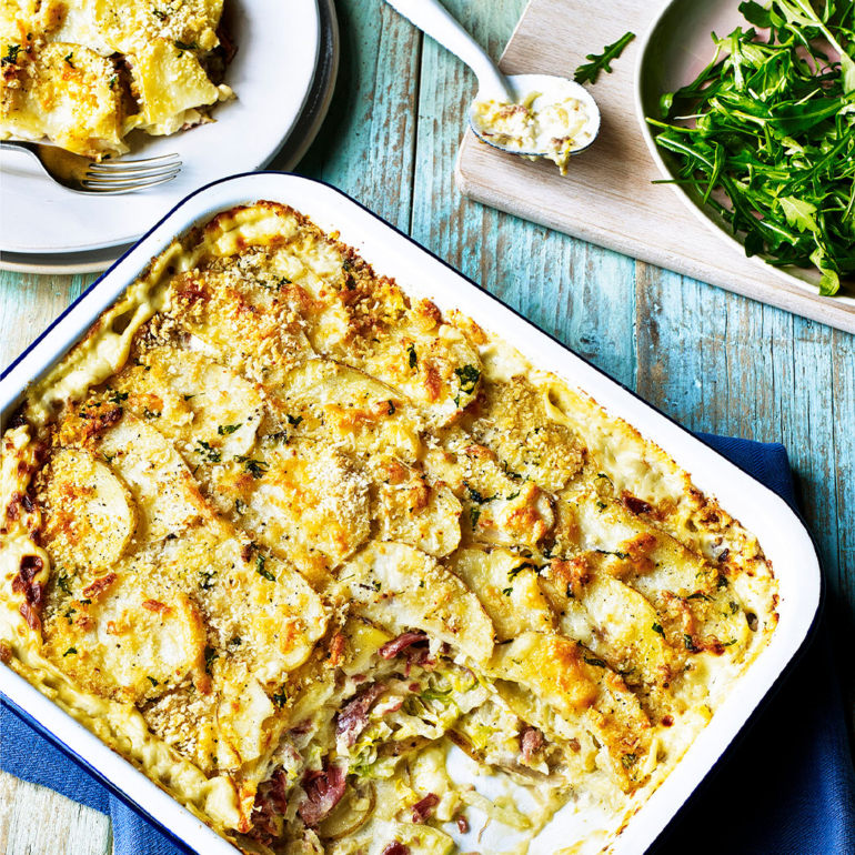 Warming family potato gratin with bacon and cabbage
