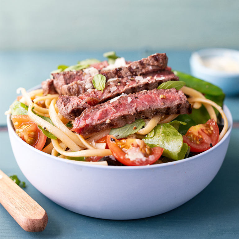 Summertime steak linguine with tomatoes and olives