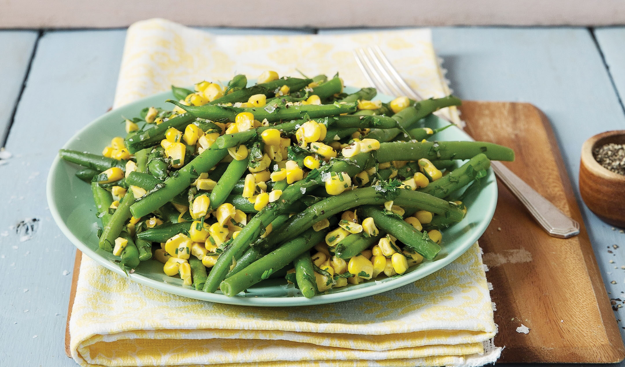 Sweetcorn and green beans with herby butter recipe | easyFood