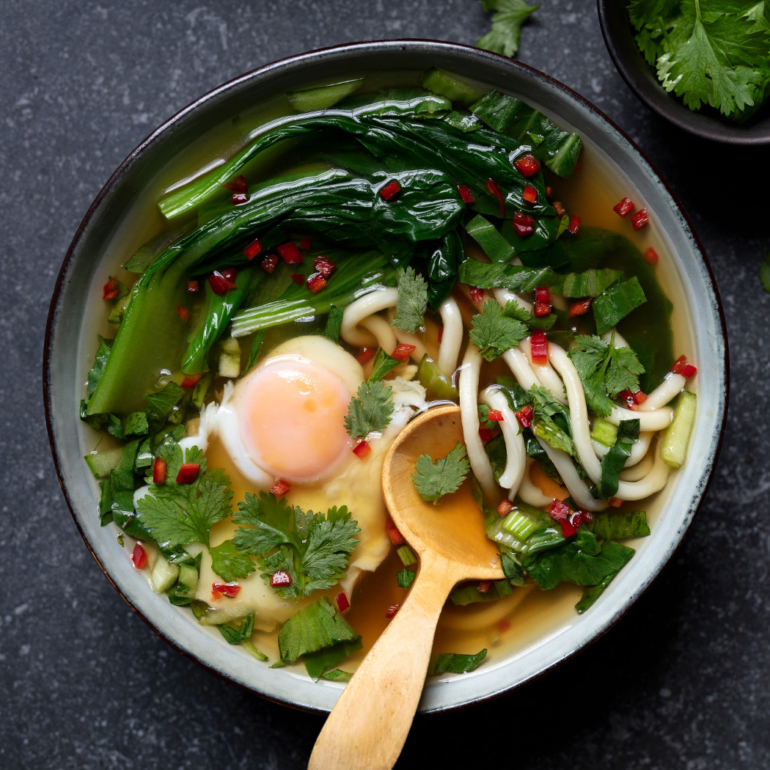 Udon noodle soup with pak choi