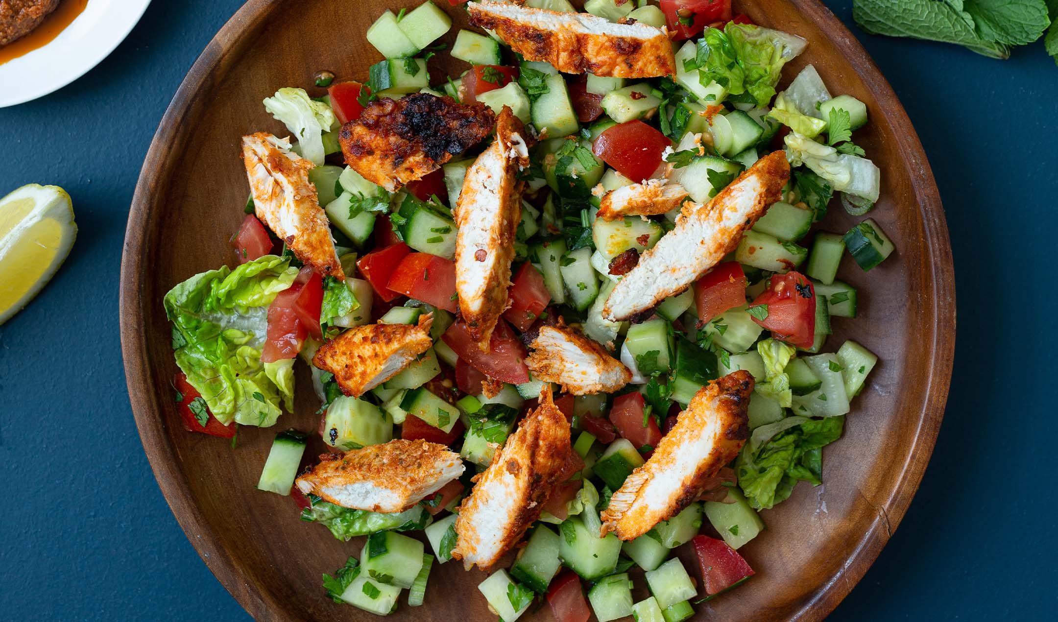 Chopped salad with harissa roasted chicken banner