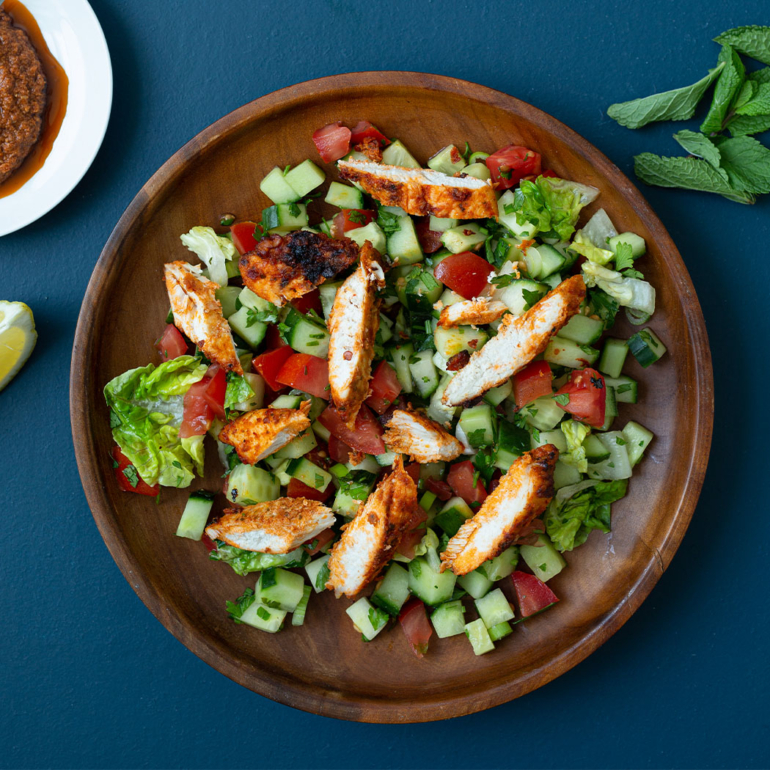 Chopped salad with harissa roasted chicken