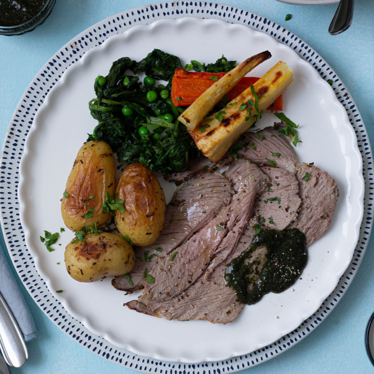 Roast leg of lamb with spring vegetables