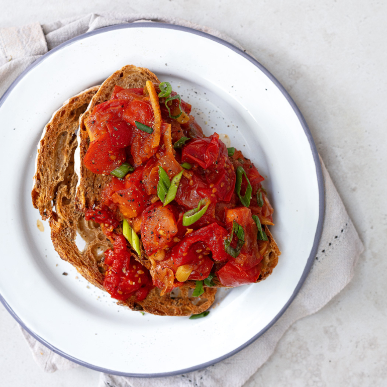 Buttered tomatoes with ginger