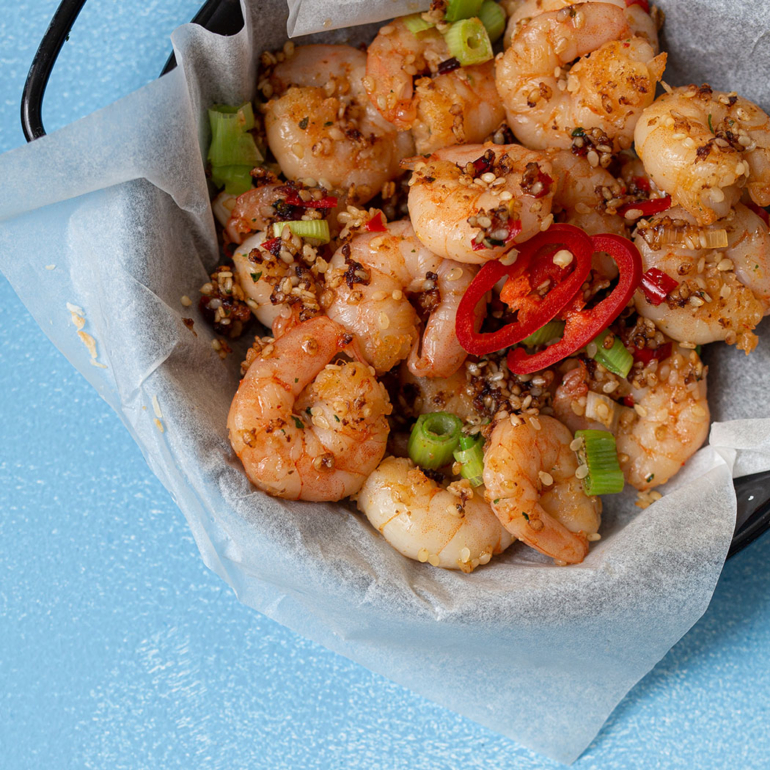 Ginger sesame prawns with summer veg and coconut rice
