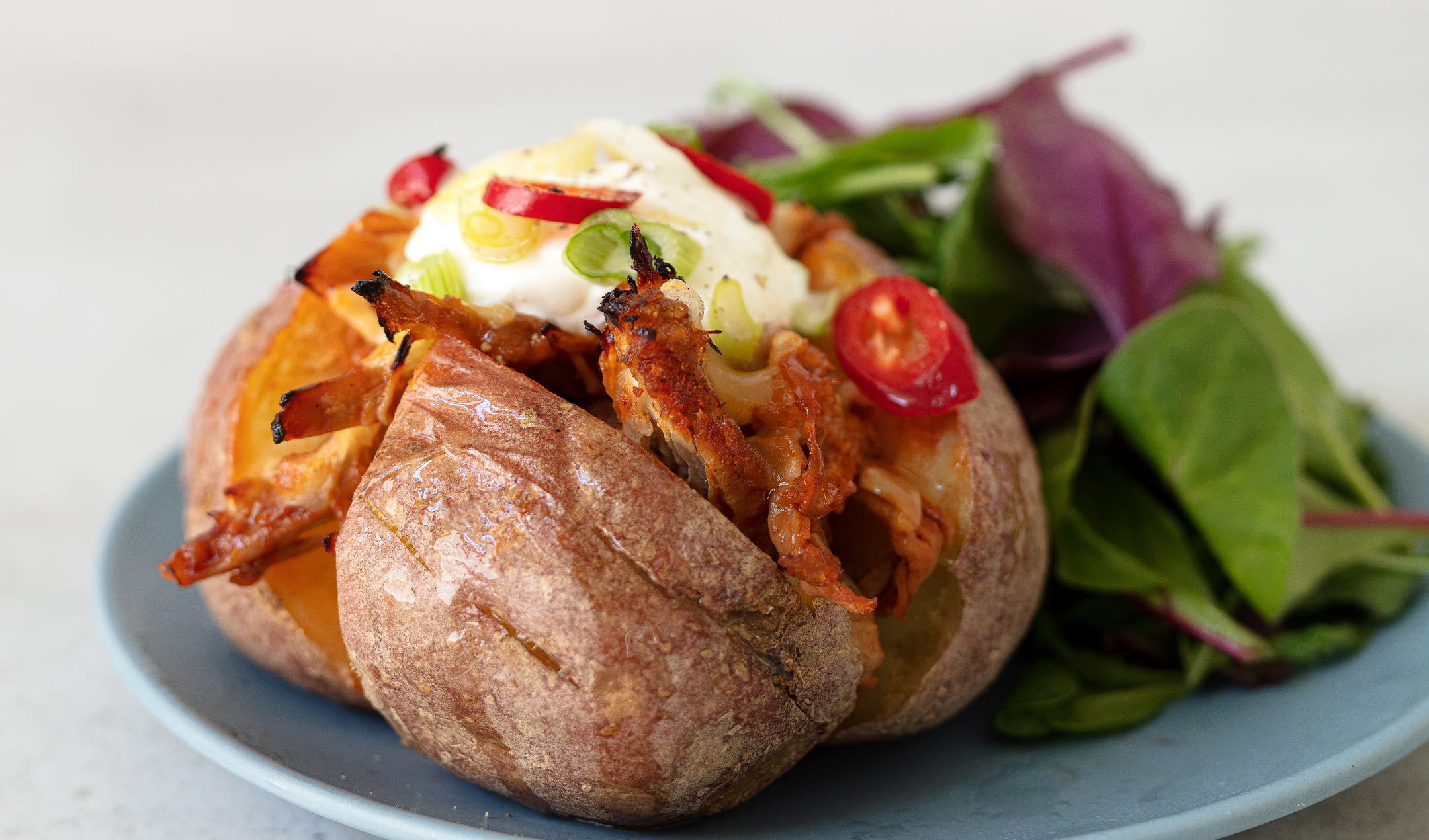 Pulled pork baked potatoes