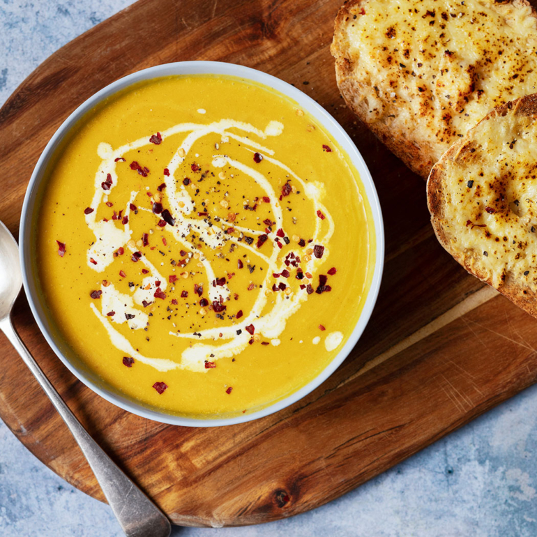 Spiced carrot and orange soup with cheesy toasts