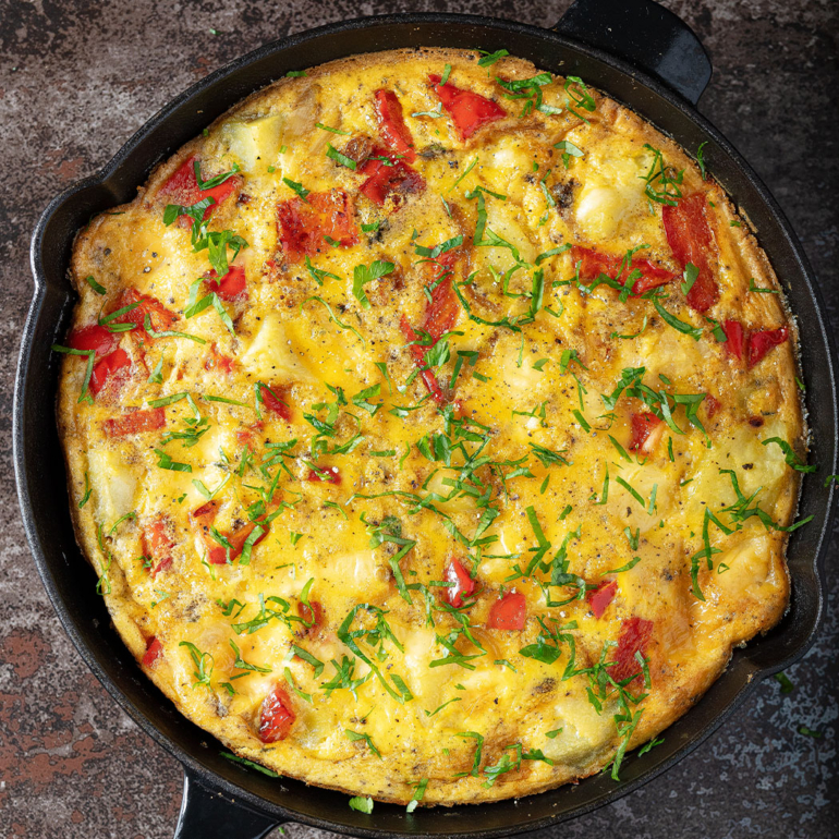 Cheesy potato and red pepper frittata