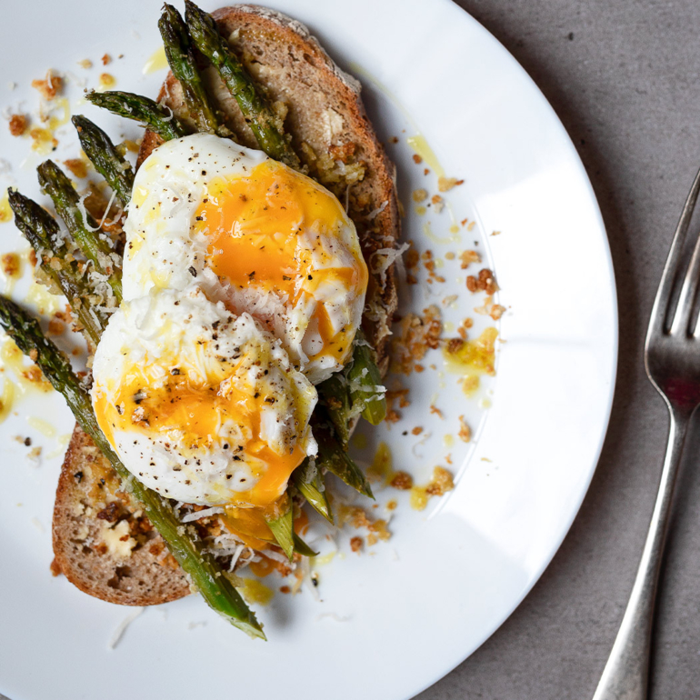 Dijon-roasted asparagus with poached eggs and almonds