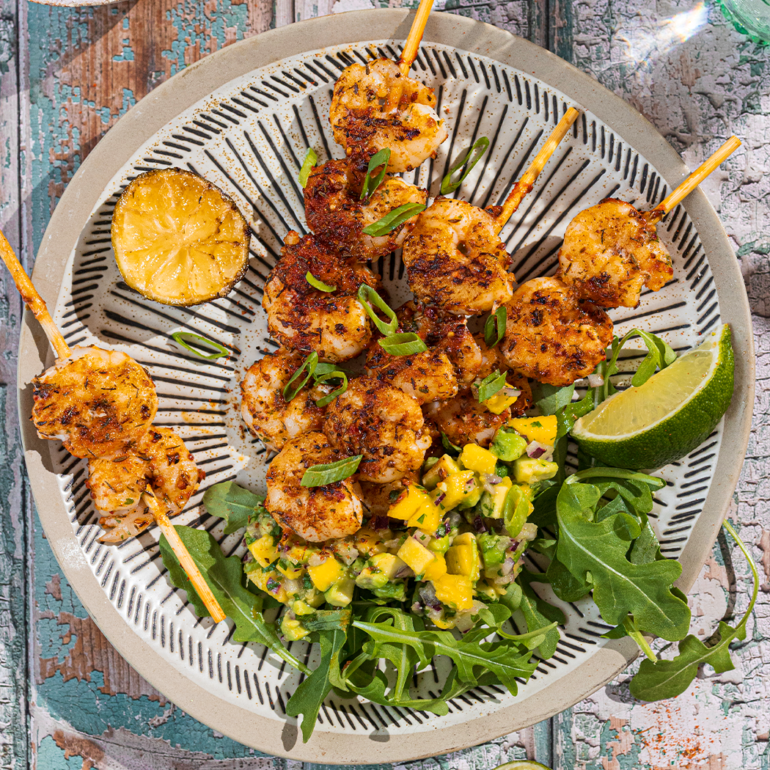Cajun shrimp skewers with mango, avocado and lime salsa